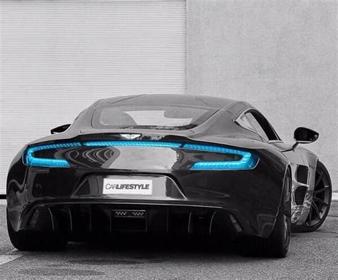 Aston Martin with blue tail lights | Cars and motorcycles | Pinterest ...