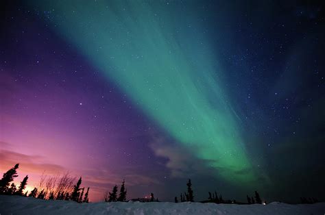 Aurora Borealis In Fairbanks by Noppawat Tom Charoensinphon