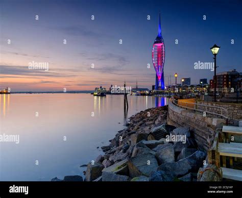 Portsmouth, UK - May 9, 2020: Sunset over Portsmouth Harbour from Old Portsmouth with the ...