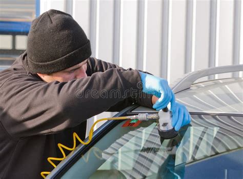 Repair crack in windshield stock photo. Image of glue - 19656802