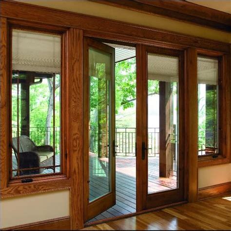 Pella French doors with motorized between-the-glass blinds and shades ...