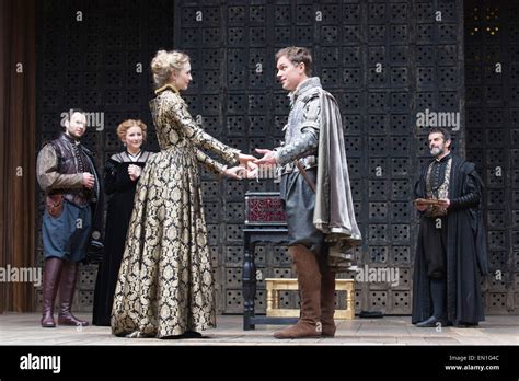 London, UK. 25 April 2015. L-R: David Sturzaker as Gratiano, Dorothea Myer-Bennet as Nerissa ...