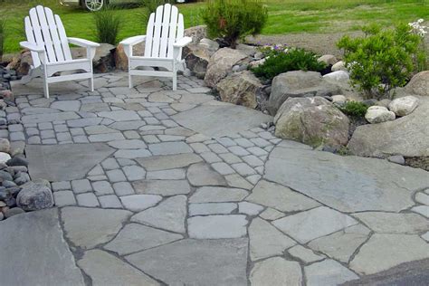 Natural Stone Patio and Terrace Living Area by Gogan Landscaping