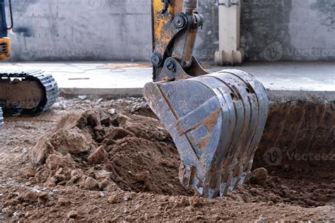 Working Excavator Tractor Digging 21887688 Stock Photo at Vecteezy