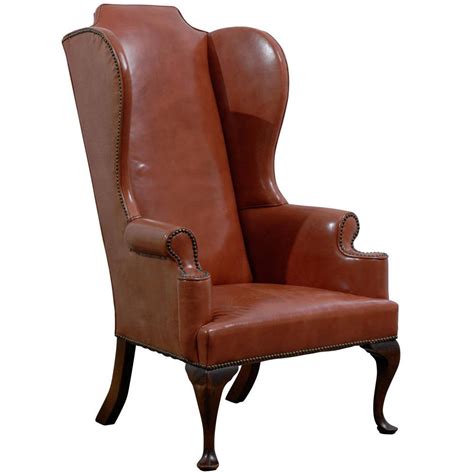 Leather Queen Anne Style Wing Chair in Burnished Orange with Nailhead Trim at 1stDibs