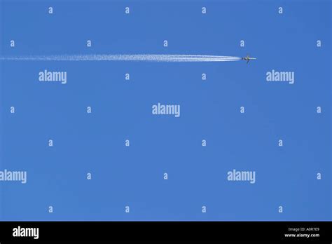 airplane and vapor trail Stock Photo - Alamy