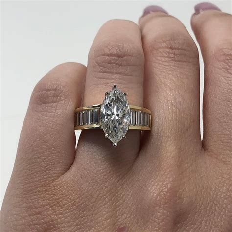 3.39 Carat Marquise Cut Diamond Ring with Baguette Diamonds at 1stDibs