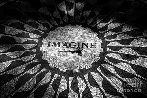 single red rose on the imagine mosaic dedicated to John Lennon in central park New York City USA ...