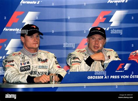 Mclarens david coulthard mika hakkinen face the worlds press hi-res stock photography and images ...