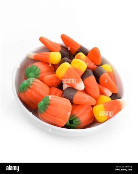 Halloween Candy Corn In A White Bowl Stock Photo - Alamy