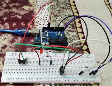 Use photoresistor with LED and Buzzer on Arduino Uno - Prgmine