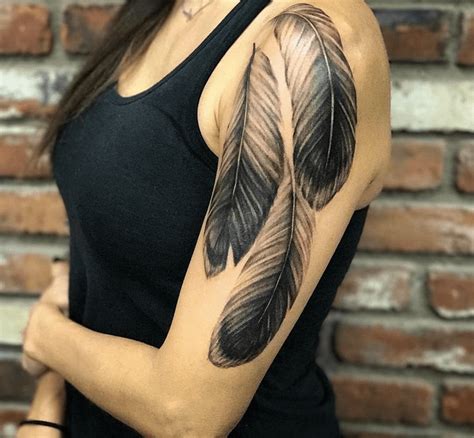 Feather Tattoo Ideas - Guide On Meaning and History - Tattoo Stylist