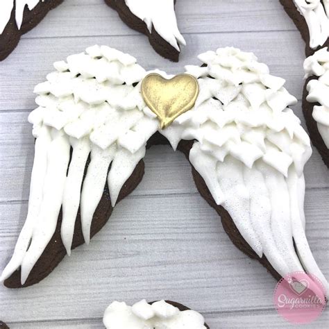 angel wings decorated sugar cookie on chocolate cocoa sugar cookie sugarnilla gold heart royal ...