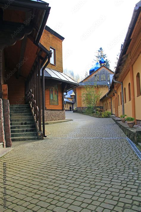 Architecture and walkway on territory of monastery Manyava Skete Stock Photo | Adobe Stock