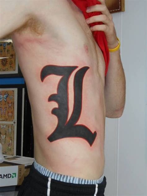 Louisville Cardinals "L" of giant proportions! Tattoo by ERIC - Tattoo Charlie's Preston Hwy ...