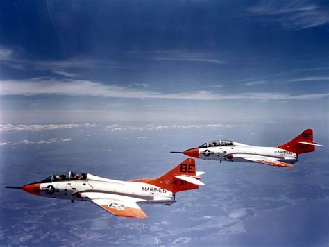 Two U.S. Marine Corps Grumman F9F-8T Cougars (BuNo 147317, 147328) from Marine Training Squadron ...