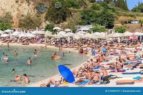 Crowds of People Sunbathing and Relaxing on Kasjuni Beach in Split, Croatia Editorial ...