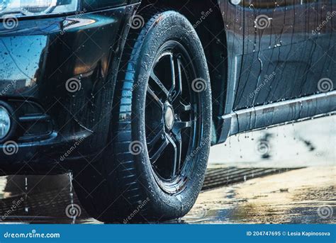 Washing the Car. Washing a Black Car at a Car Wash Stock Image - Image ...