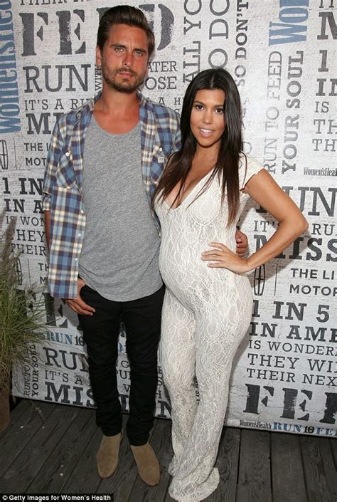 Maternity Style - Kourtney Kardashian In Plunging White Lace Jumpsuit