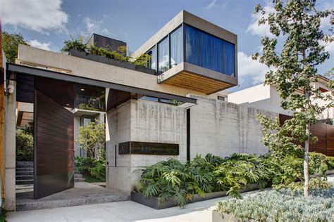 A Concrete House in Mexico City Surrounded by Gardens