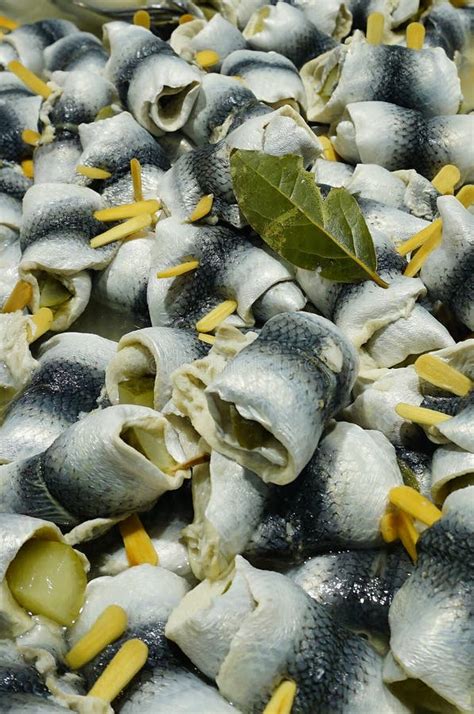 Traditional Rollmops, Pickled Herring On Bright Wooden Background. Stock Photo - Image of ...