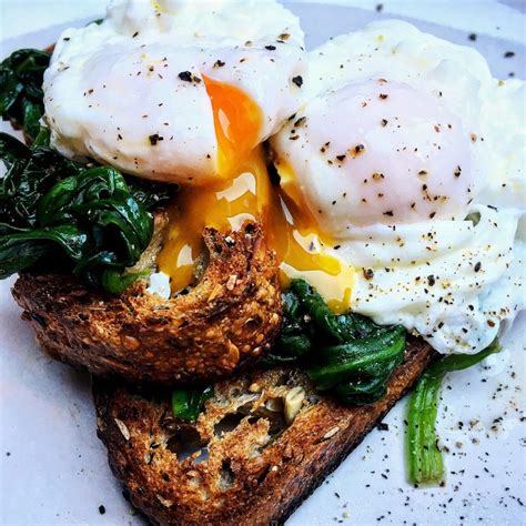 Poached Eggs with Spinach and Rosemary / Basil Infused Olive Oil Recipe ...