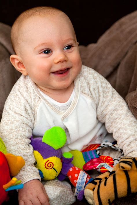 Smiling Baby With Toys Free Stock Photo - Public Domain Pictures