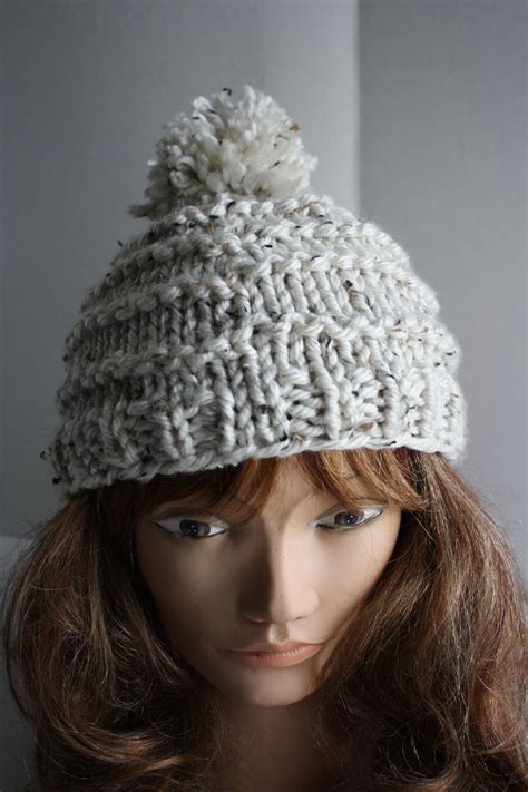 Knitted pom pom hat. | Knit pom pom hat, Winter hats, Pom pom hat