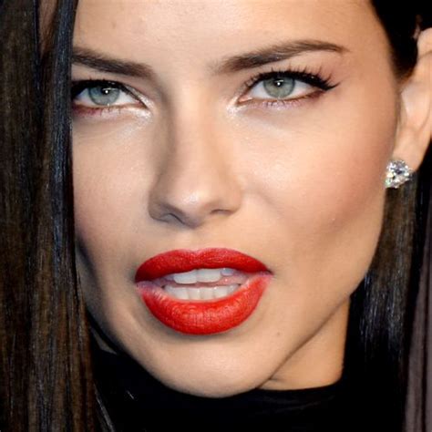 Adriana Lima Makeup: Black Eyeshadow, Silver Eyeshadow & Red Lipstick ...