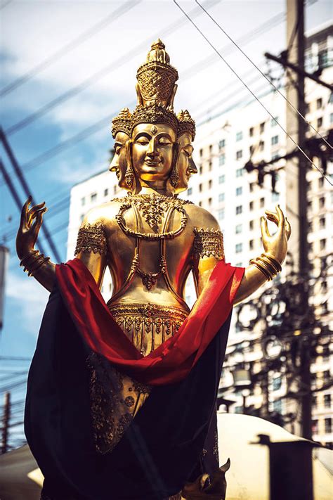 Phra Phrom statue in Bangkok Thailand Photograph by Eduardo Huelin - Fine Art America