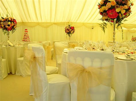Chair covers inside wedding marquee | View on our website he… | Flickr