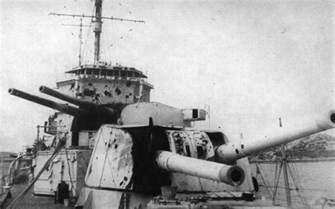 Battle damage to HMS Exeter after engaging the pocket battleship Graf Spee at the Battle of the ...