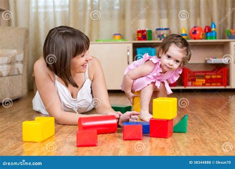 Mom and Kid Play Toys at Home Stock Photo - Image of family, maternity ...