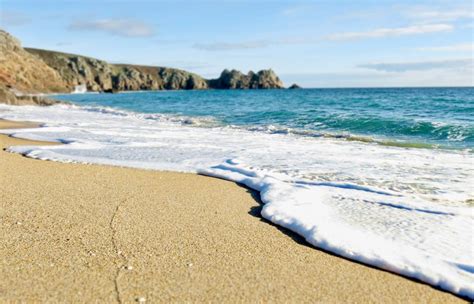 Porthcurno Cove - High tide | Cornwall Guide