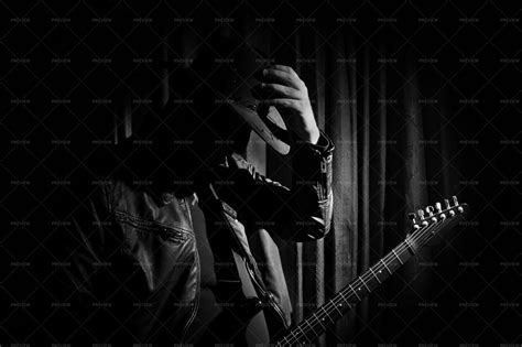 Guitarist In The Shadows - Stock Photos | Motion Array