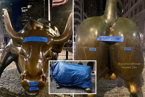 Wall Street Charging Bull is covered with tarp after being 'vandalized' with 'hold the line ...