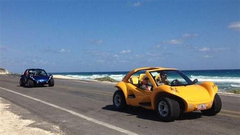 Discover Cozumel's many hidden treasures as you set out in a dune buggy ...