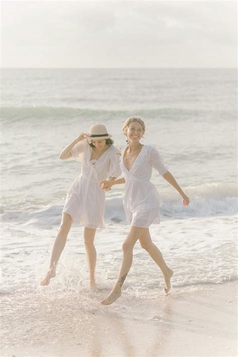 Couple Holding Hands while on the Beach · Free Stock Photo