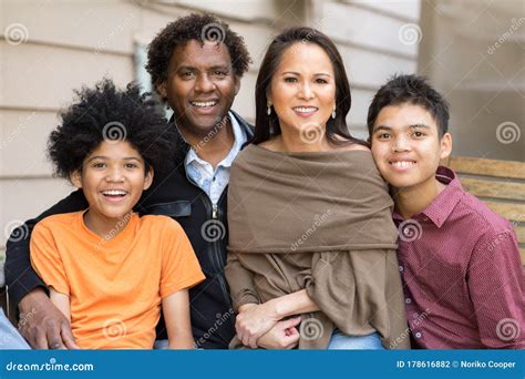 Portrait of a Mixed Race Family Smiling. Stock Photo - Image of siblings, headshot: 178616882