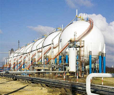 Oil Refinery Storage Tanks Photograph by Paul Rapson | Pixels