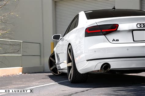 Gorgeous White Audi A8 Sedan on Black Custom Wheels — CARiD.com Gallery