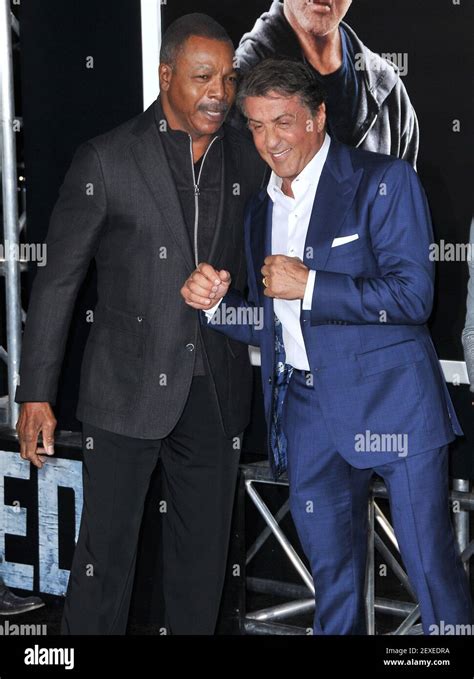 (L-R) Carl Weathers and Sylvester Stallone arrives at the "Creed" Los ...