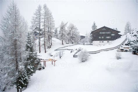 mountain house in snowstorm 10681117 Stock Photo at Vecteezy