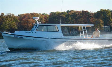 Charter a 38 ft Evans Somerset Cuddy Cabin Fishing Boat for 6 People in Deale, Maryland | GetMyBoat