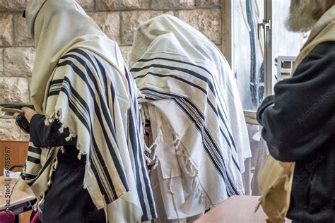 Jewish men praying in a synagogue with Tallit Stock Photo | Adobe Stock