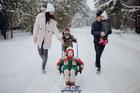 Family Having Fun on Snow · Free Stock Photo