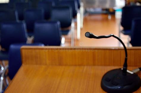 Microphone on Wooden Podium Stock Image - Image of podium, conference: 31678417