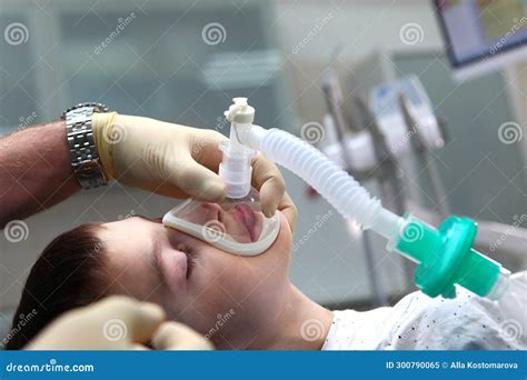 A Child with an Oxygen Mask on His Face. Preparing the Child for Anesthesia. Dental Surgery ...