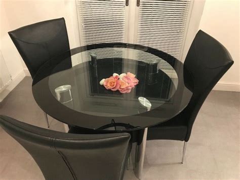 Amazing black glass round dining | Glass round dining table, Round dining, Round dining table