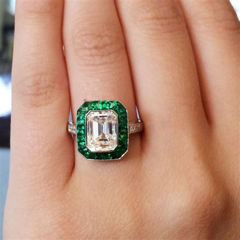 Platinum 2.51ct Emerald Cut Diamond Emerald Halo Engagement Ring